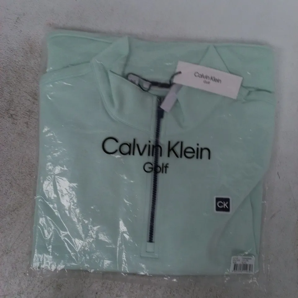 BAGGED CALVIN KLEIN GOLF 1/2 ZIP JACKET IN PALE MINT GREEN SIZE XL