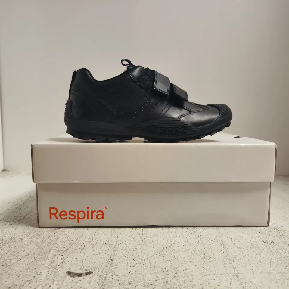 BOXED PAIR OF GEOX VELCRO STRAP TRAINERS IN BLACK SIZE 2.5