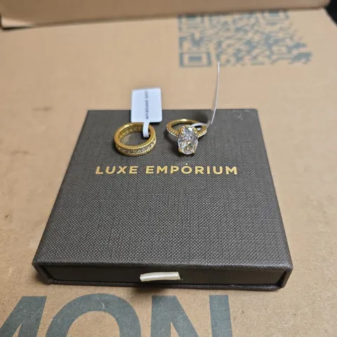 LUXE EMPORIUM GOLD-TONE RING SET WITH CRYSTAL SOLITAIRE – BOXED 2 RINGS STATED AS SIZE 4