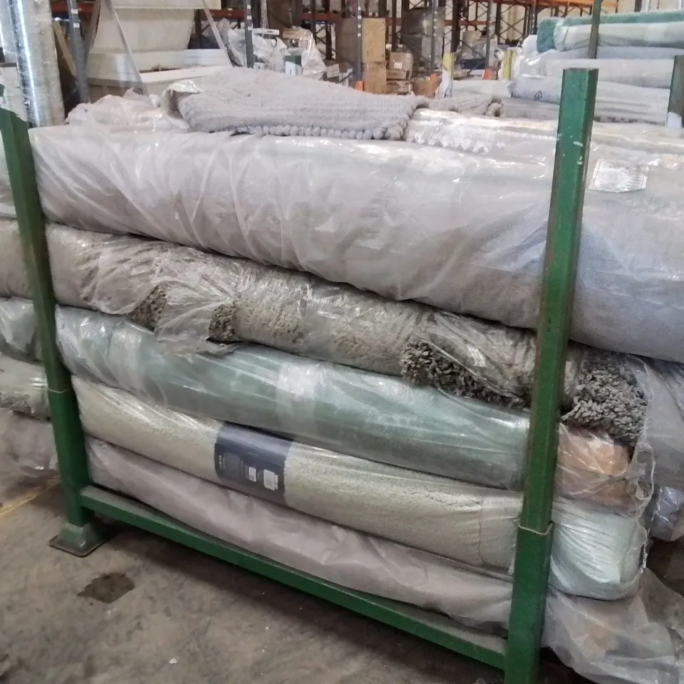 STILLAGE OF APPROXIMATELY 20 BAGGED QUALITY DESIGNER RUGS