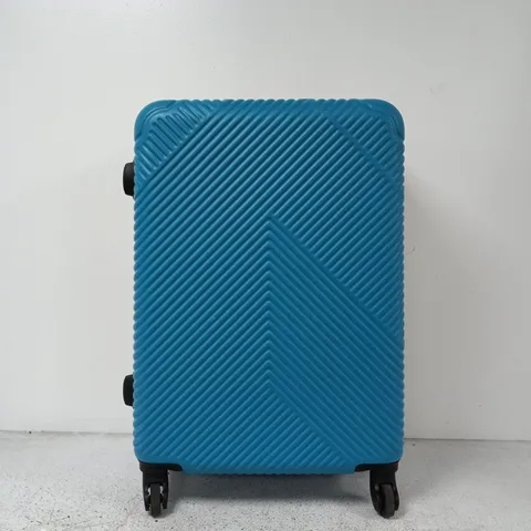 UNBRANDED BLUE HARD-SHELL WHEELED SUITCASE WITH DIAGONAL RIBBED PATTERN