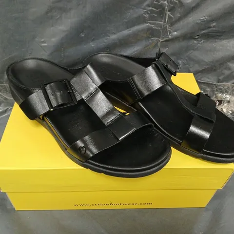 BOXED PAIR OF STRIVE SANTORINI SANDALS IN BLACK - SIZE 7