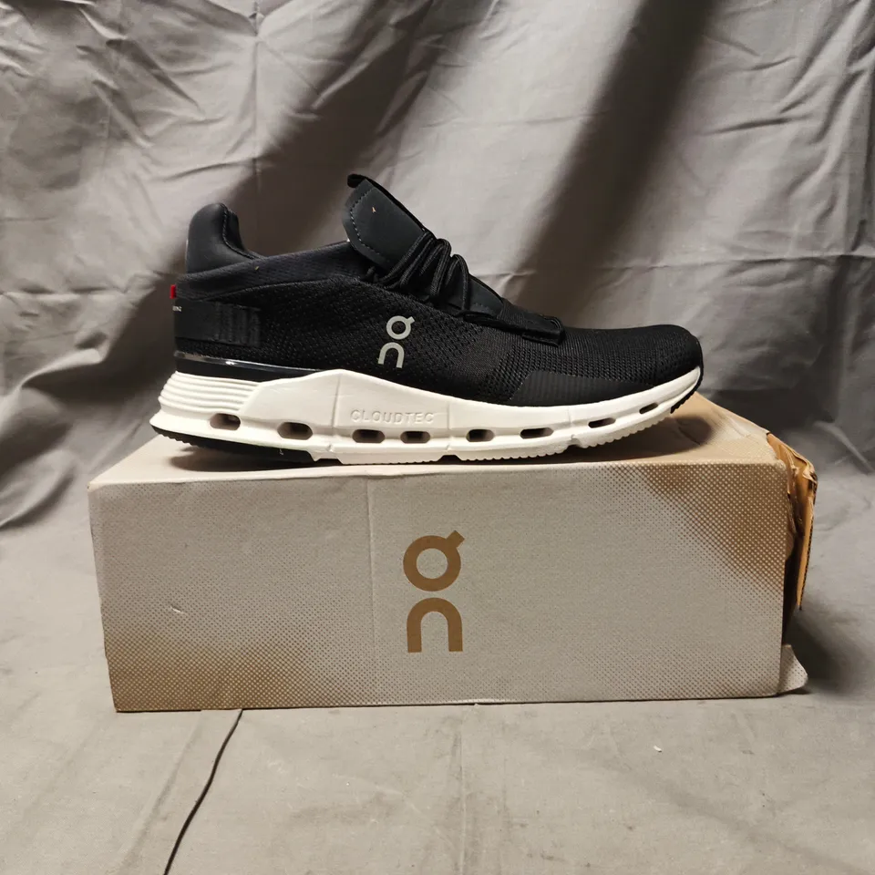 BOXED PAIR OF ON CLOUDNOVA SHOES IN PHANTOM/WHITE SIZE UK 7.5