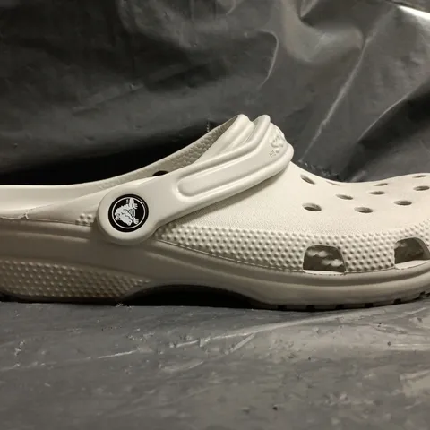 PAIR OF CROCS CLASSIC CLOGS IN GREY SIZE UK M6/W7