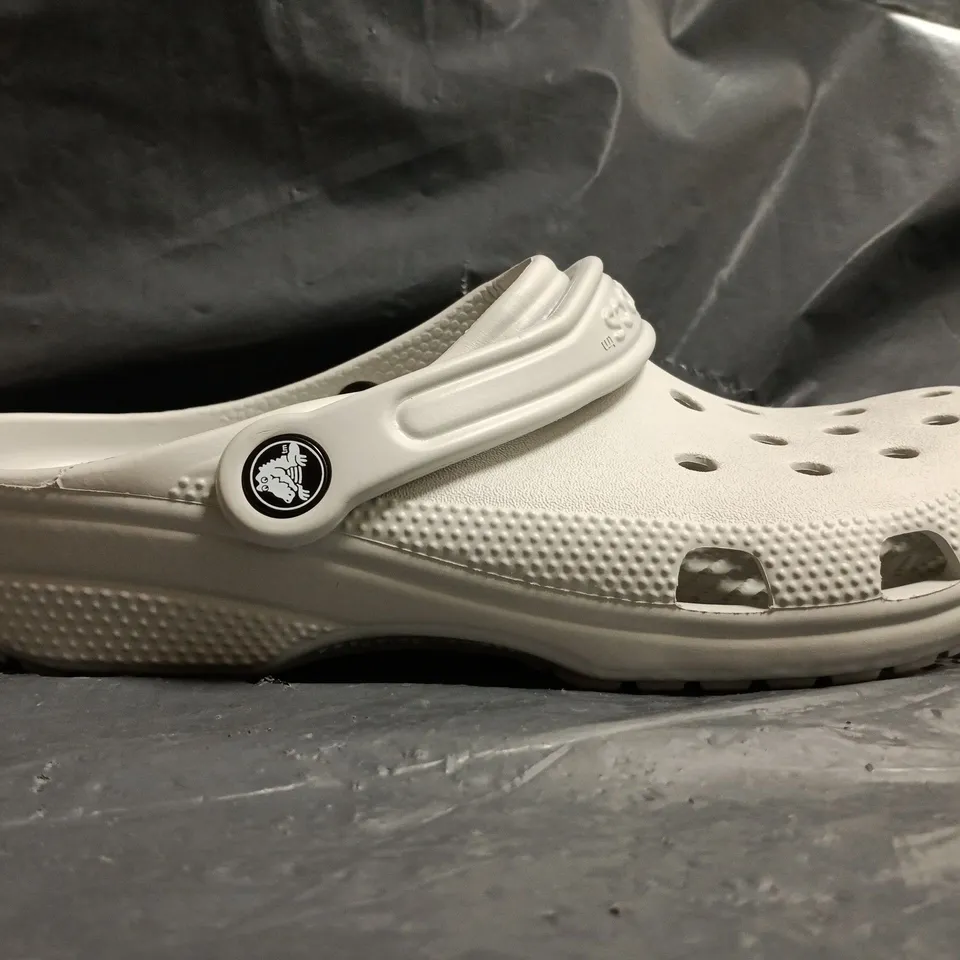 PAIR OF CROCS CLASSIC CLOGS IN GREY SIZE UK M6/W7