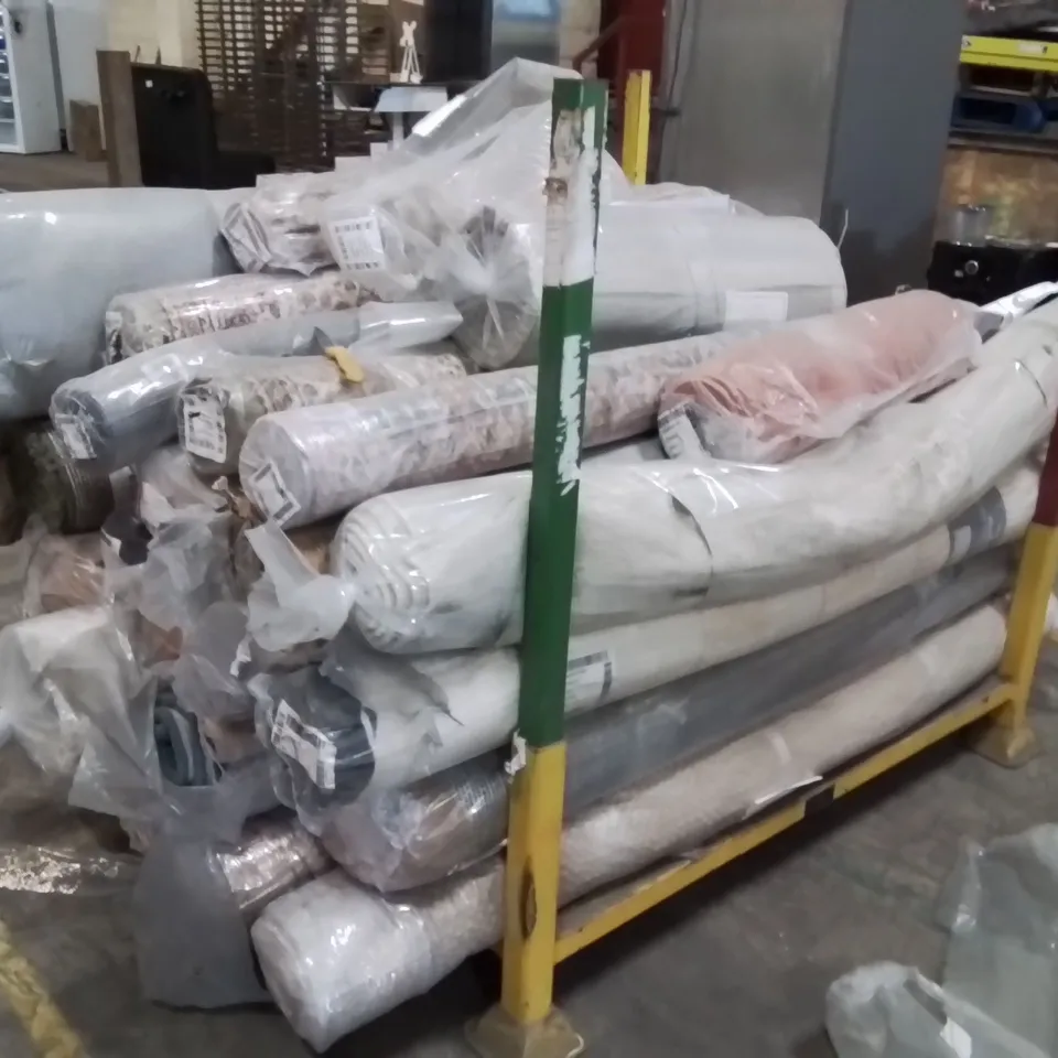 STILLAGE OF APPROXIMATELY 20 BAGGED QUALITY DESIGNER RUGS