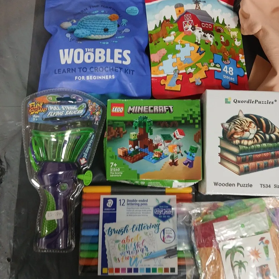 LARGE QUANTITY OF ASSORTED TOYS AND GAMES TO INCLUDE THE WOOBLES CROCHET SET, LEGO MINECRAFT, CONSTRUCTION SET AND T-REX FIGURINE