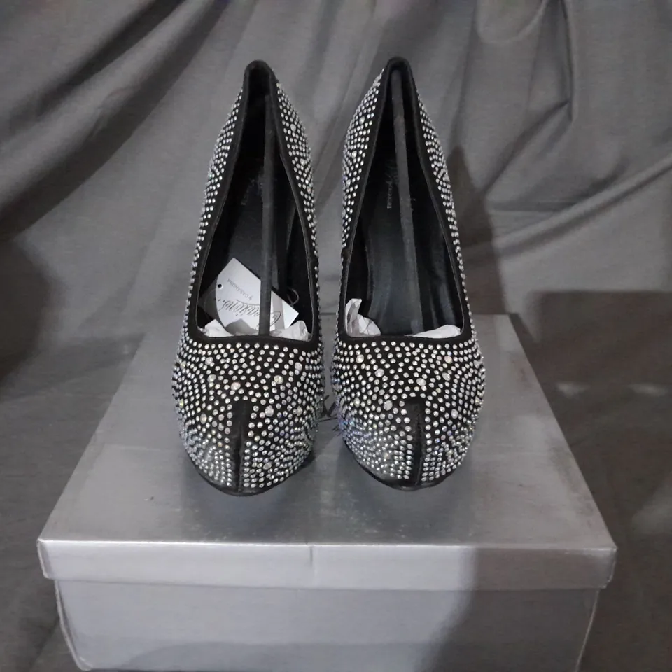 APPROXIMATELY 10 BOXED PAIRS OF COLOURED GEM PLATFORM HIGH HEELS