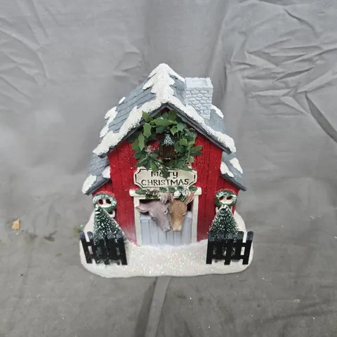 APPROXIMATELY 12 DONKEY STABLE WITH LED LIGHT ORNAMENTS