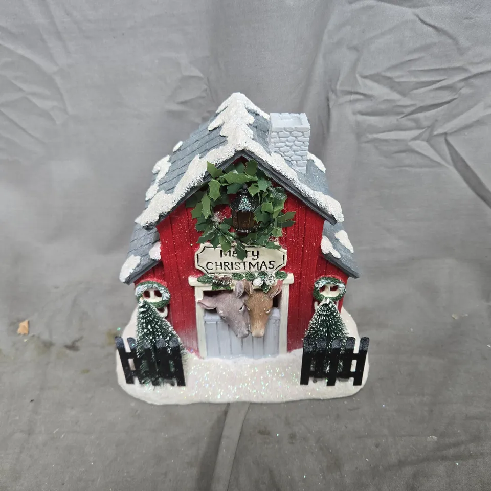 APPROXIMATELY 12 DONKEY STABLE WITH LED LIGHT ORNAMENTS