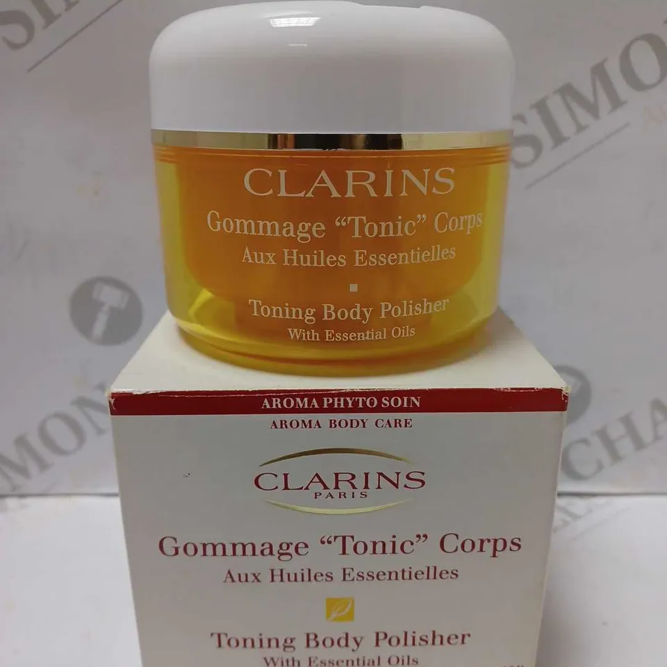 CLARINS TONIC BODY POLISHER WITH ESSENTAIL OILS 250G