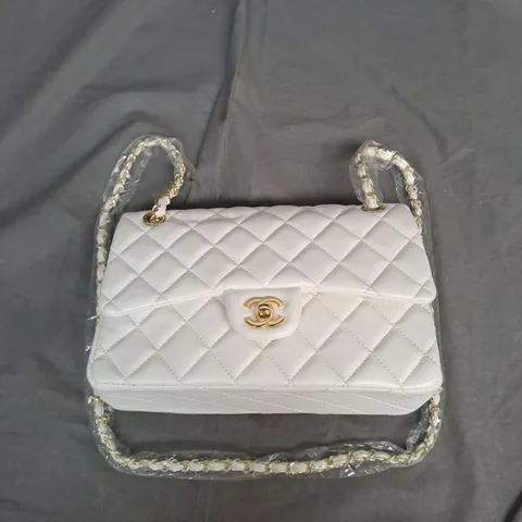 CHANEL QUILTED GOLD CHAIN HANDBAG IN IVORY