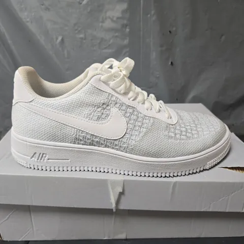 BOXED PAIR OF NIKE AIR FORCE FLYKNIT 2.0 TRAINERS IN GREY - UK 7.5