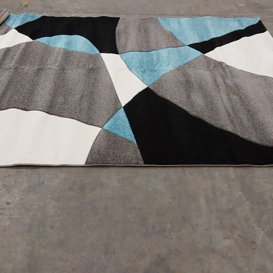 CHAYA FLATWEAVE RUG IN TURQUOISE/GREY/BLACK - APPROXIMATELY 7'10" X 10'10"