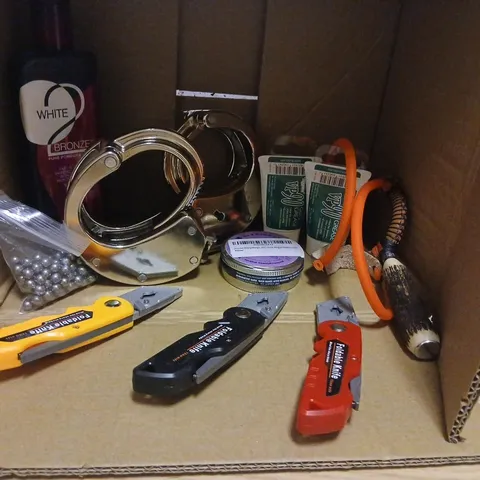 ASSORTED PRODUCTS TO INCLUDE; CATAPULTS, AIR GUN PELLETS, HANDCUFFS, GUN GREASE AND FOLDABLE KNIFE SHELLS.