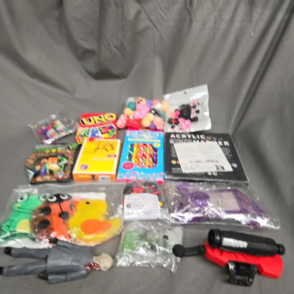 APPROXIMATELY 10 ASSORTED TOYS AND GAMES TO INCLUDE UNO, PENS AND CARD GAMES