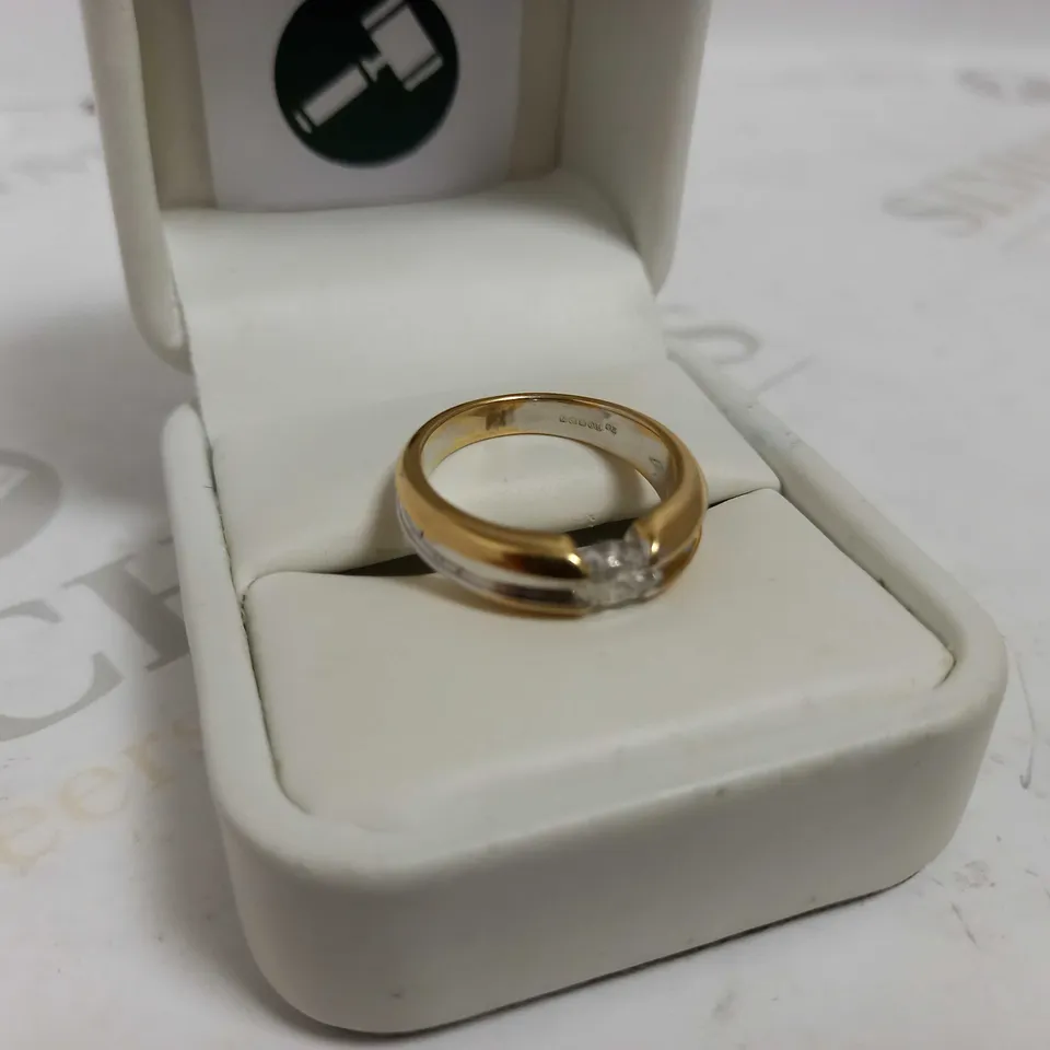 DESIGNER 18CT GOLD SOLITAIRE RING TENSION-SET WITH A MARQUISE CUT DIAMOND
