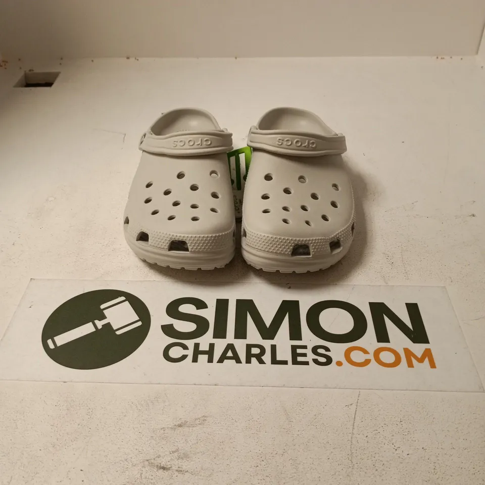 UNBOXED PAIR OF CROCS CLASSICS IN LIGHT GREY - M10/W12
