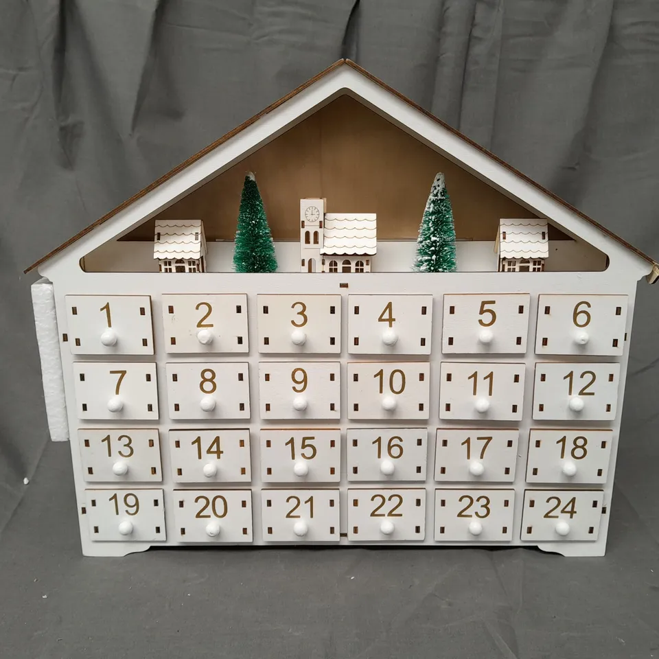 BOXED UNBRANDED PRE-LIT WOODEN VILLAGE SCENE ADVENT CALENDAR IN WHITE