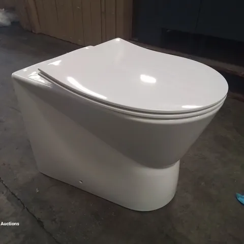 DESIGNER CERAMIC TOILET WITH SOFT CLOSE SEAT