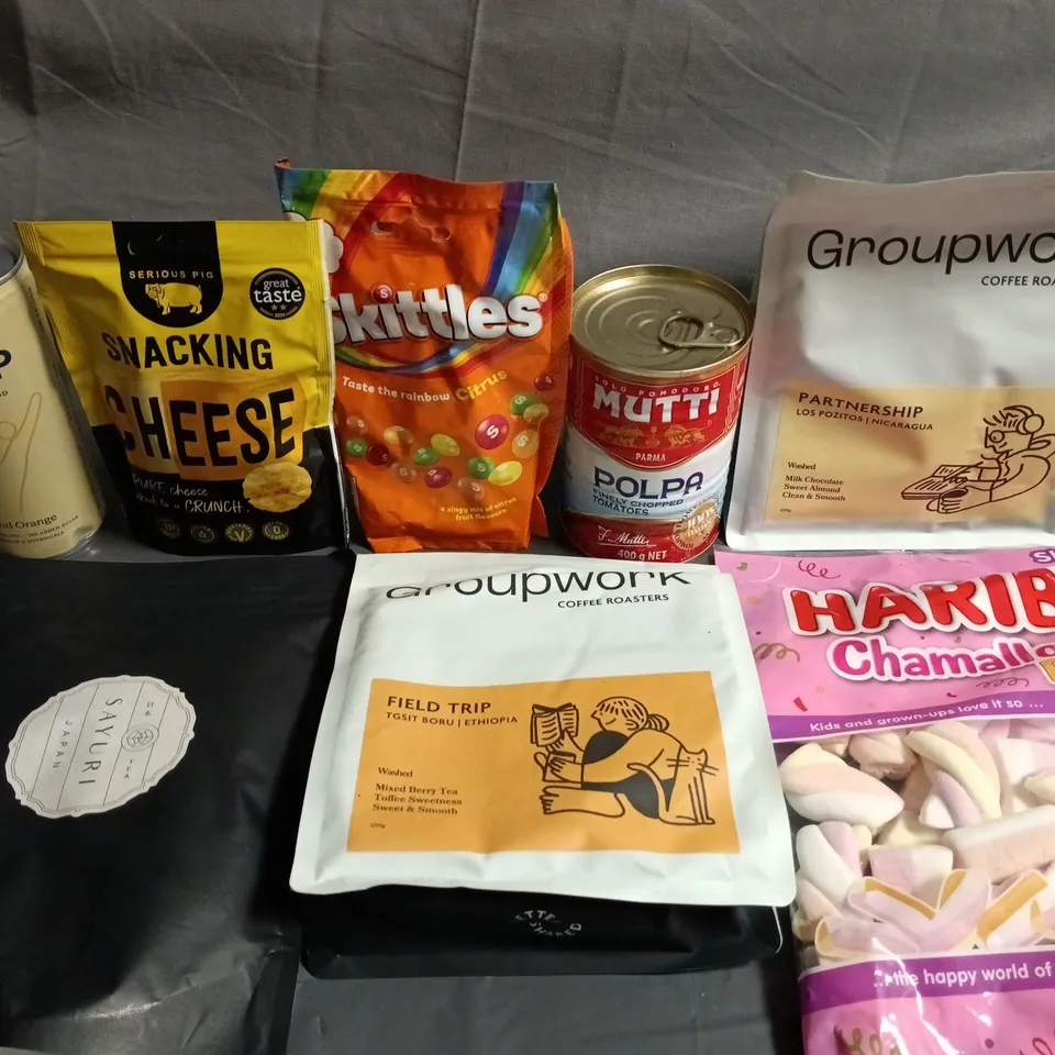 APPROXIMATELY 10 ASSORTED FOOD AND DRINK  ITEMS TO INCLUDE - HARIBO'S, SKITTLES AND ASSORTED COFFEE'S