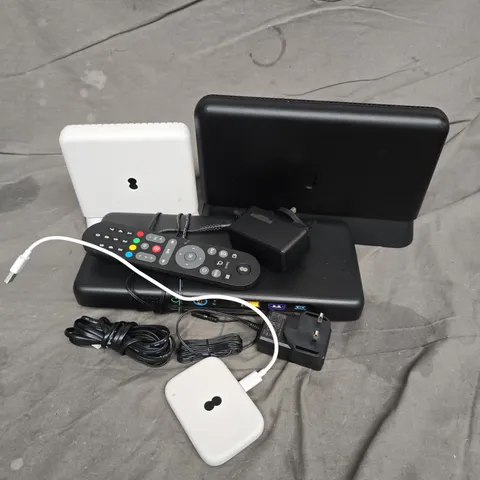 APPROXIMATELY 10 ASSORTED HOUSEHOLD ITEMS TO INCLUDE ROUTERS, CABLES, REMOTES, ETC
