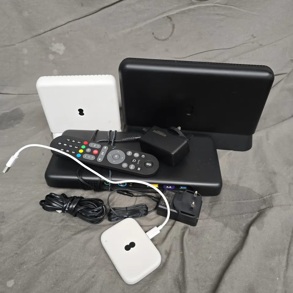 APPROXIMATELY 10 ASSORTED HOUSEHOLD ITEMS TO INCLUDE ROUTERS, CABLES, REMOTES, ETC