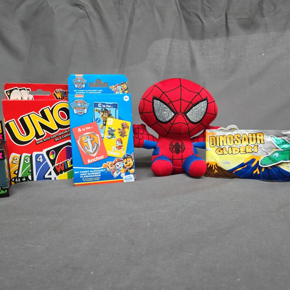 BOX OF APPROX 12 ASSORTED TOYS TO INCLUDE - UNO CARDS , NICE CUBE , SPIDERMAN PLUSH ETC