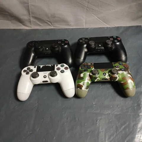 4 X PLAYSTATION GAME CONTROLLERS