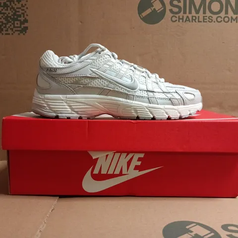 BOXED PAIR OF NIKE P-6000 TRAINERS IN WHITE SIZE UK 4