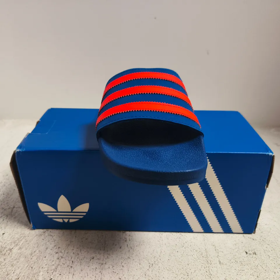 BOXED PAIR OF ADIDAS ADILETTE SLIDES IN BLUE/ORANGE SIZE UK 9