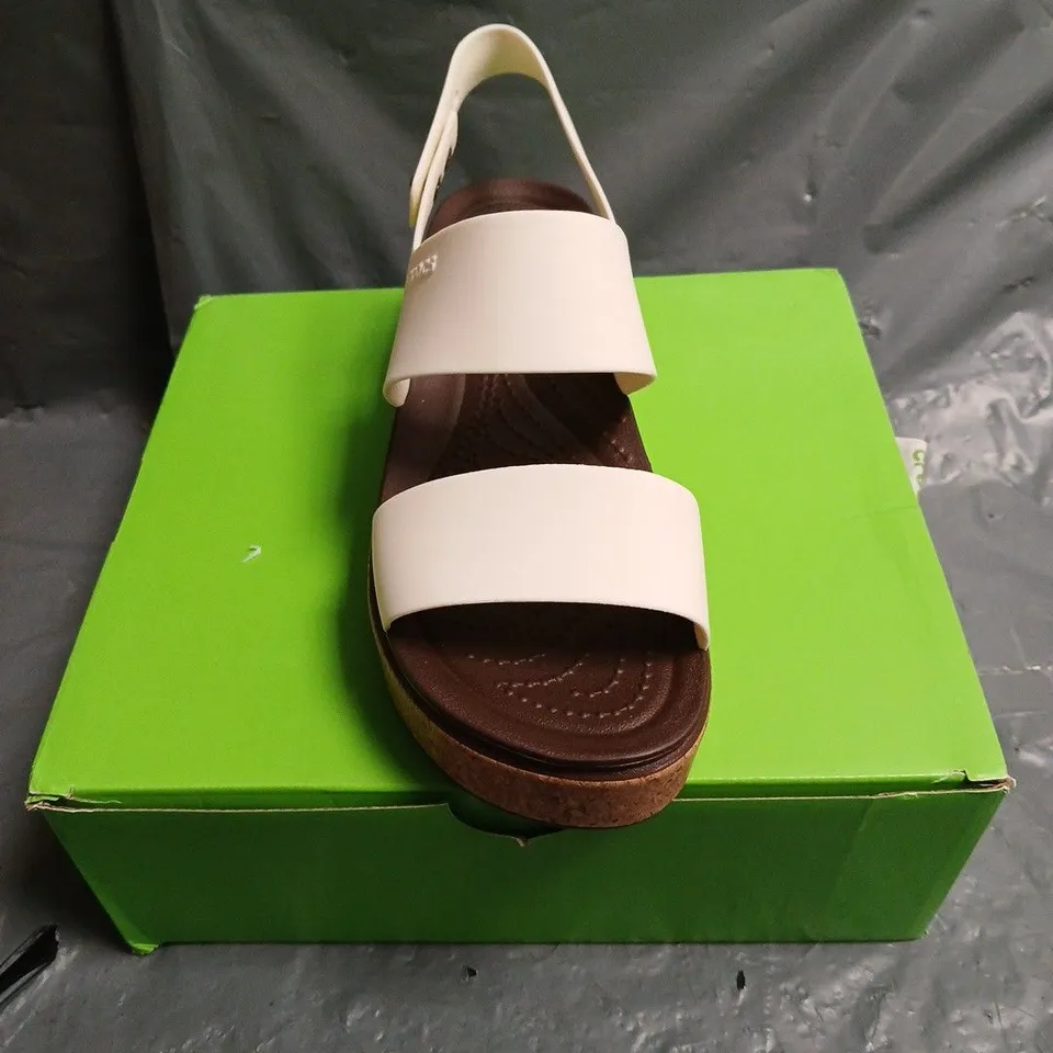 BOXED PAIR OF CROCS BROOKLY CORK LOW WEDGE SANDALS - 5
