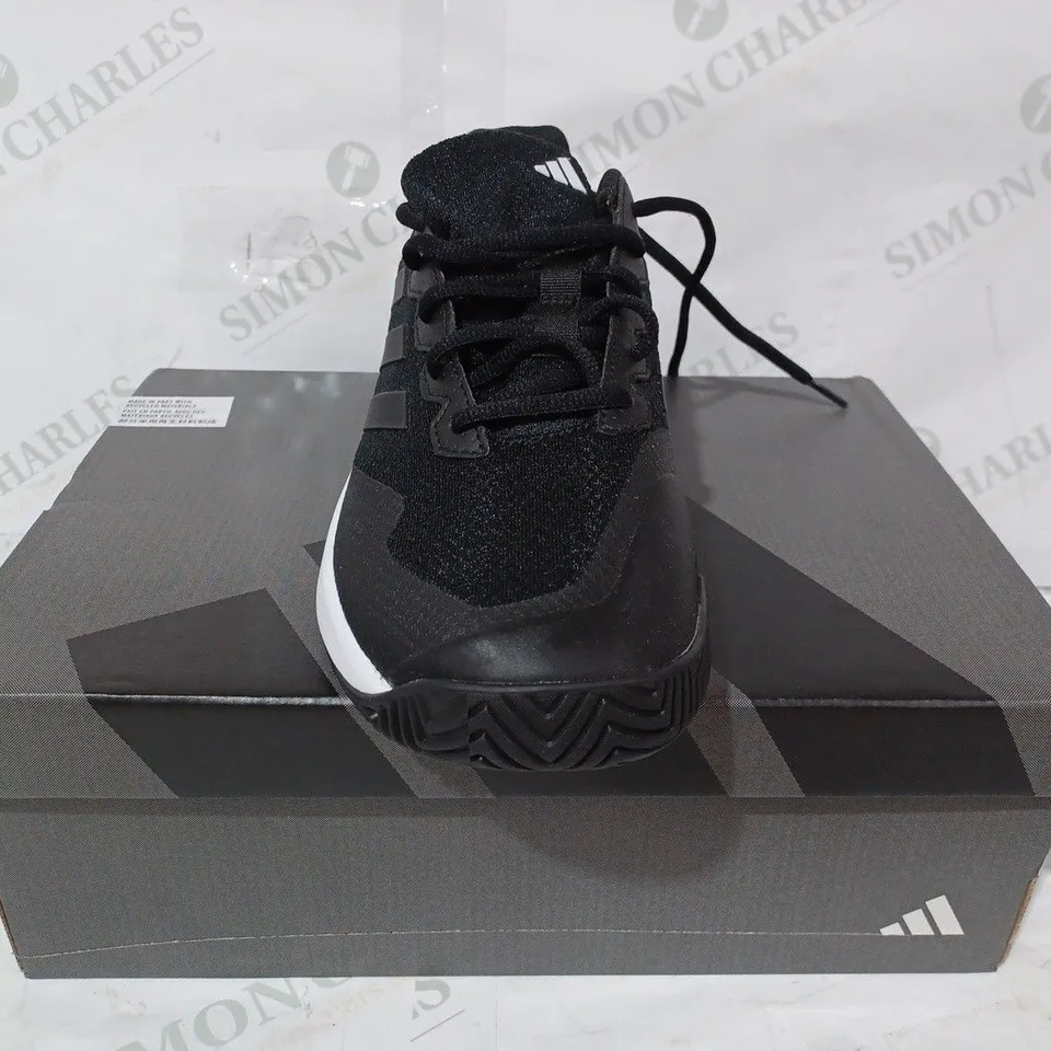BOXED PAIR OF ADIDAS GAMECOURT 2 M SHOES IN BLACK UK SIZE 8.5