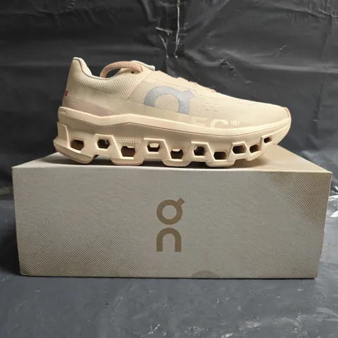 BOXED PAIR OF ON CLOUDMONSTER TRAINERS IN MOON/FAWN SIZE UK 5