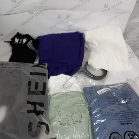 LARGE BOX OF ASSORTED CLOTHING ITEMS IN VARIOUS COLOURS AND SIZES INCLUDING TROUSERS , TOPS AND JUMPERS