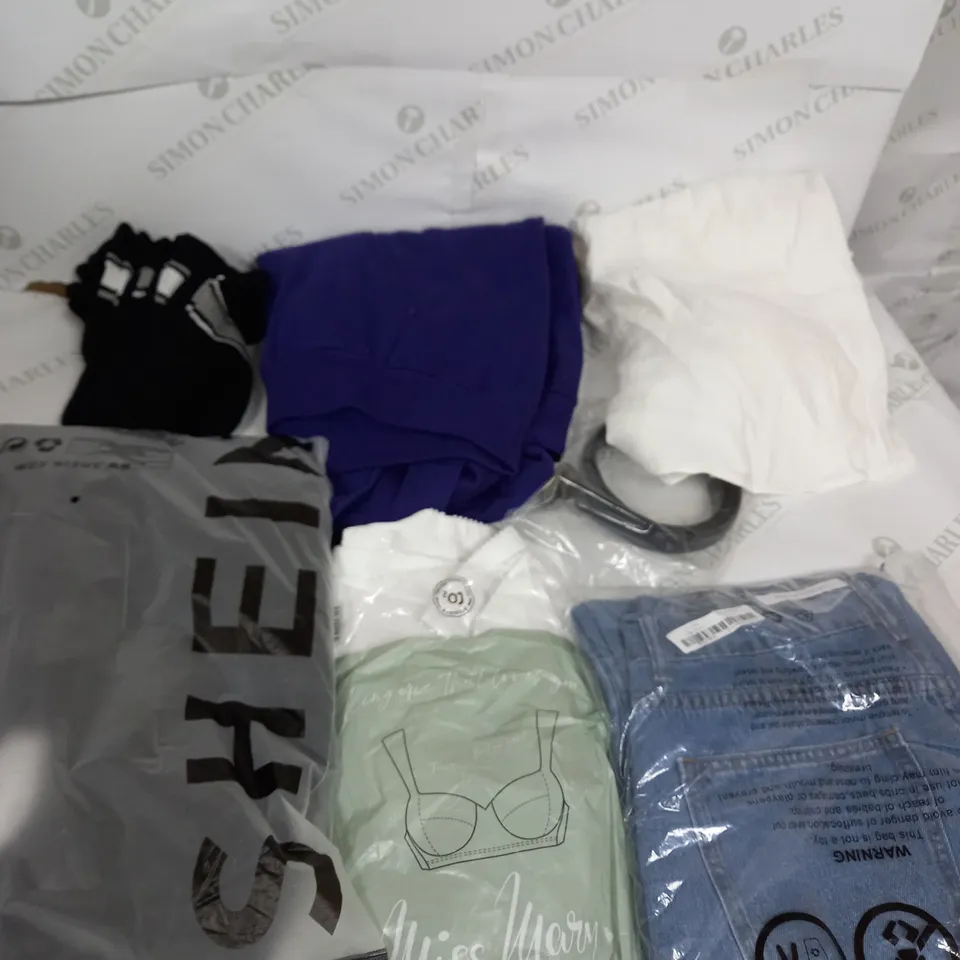 LARGE BOX OF ASSORTED CLOTHING ITEMS IN VARIOUS COLOURS AND SIZES INCLUDING TROUSERS , TOPS AND JUMPERS 