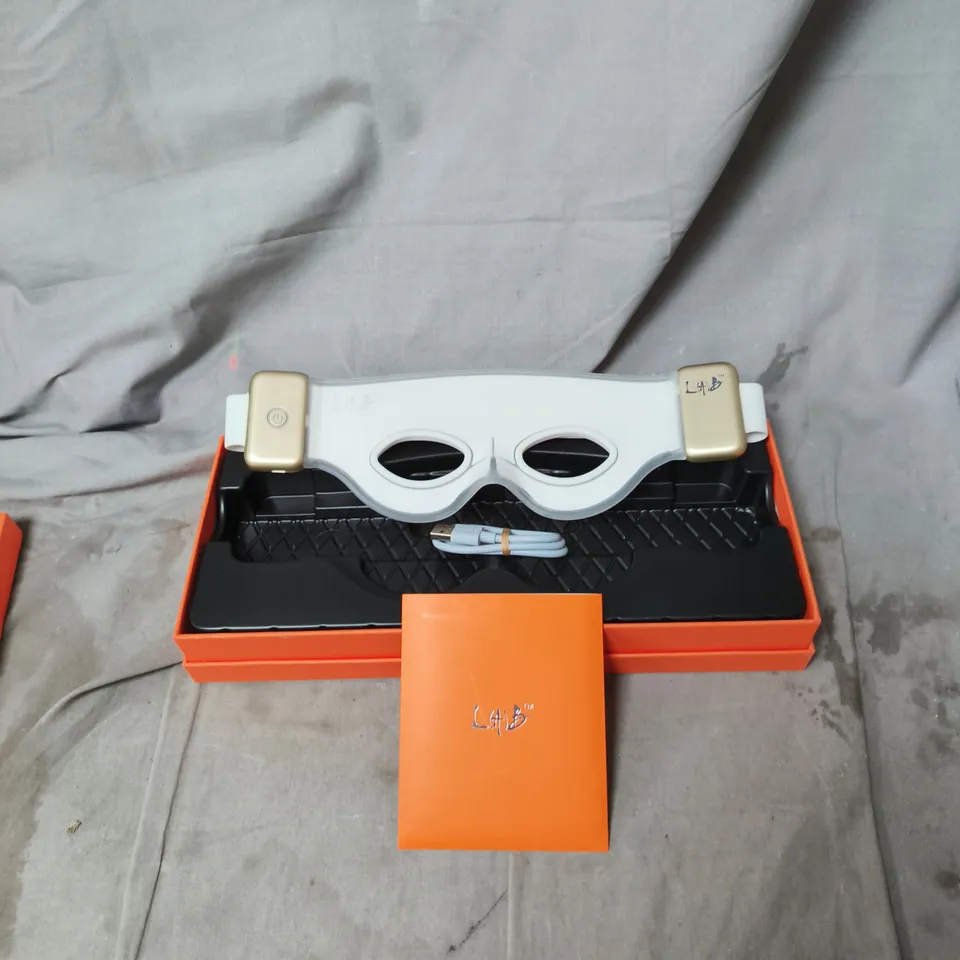 ELYSIUM SUPRA-ORBITAL FACE WEAR – WHITE MASK IN ORANGE BOX.