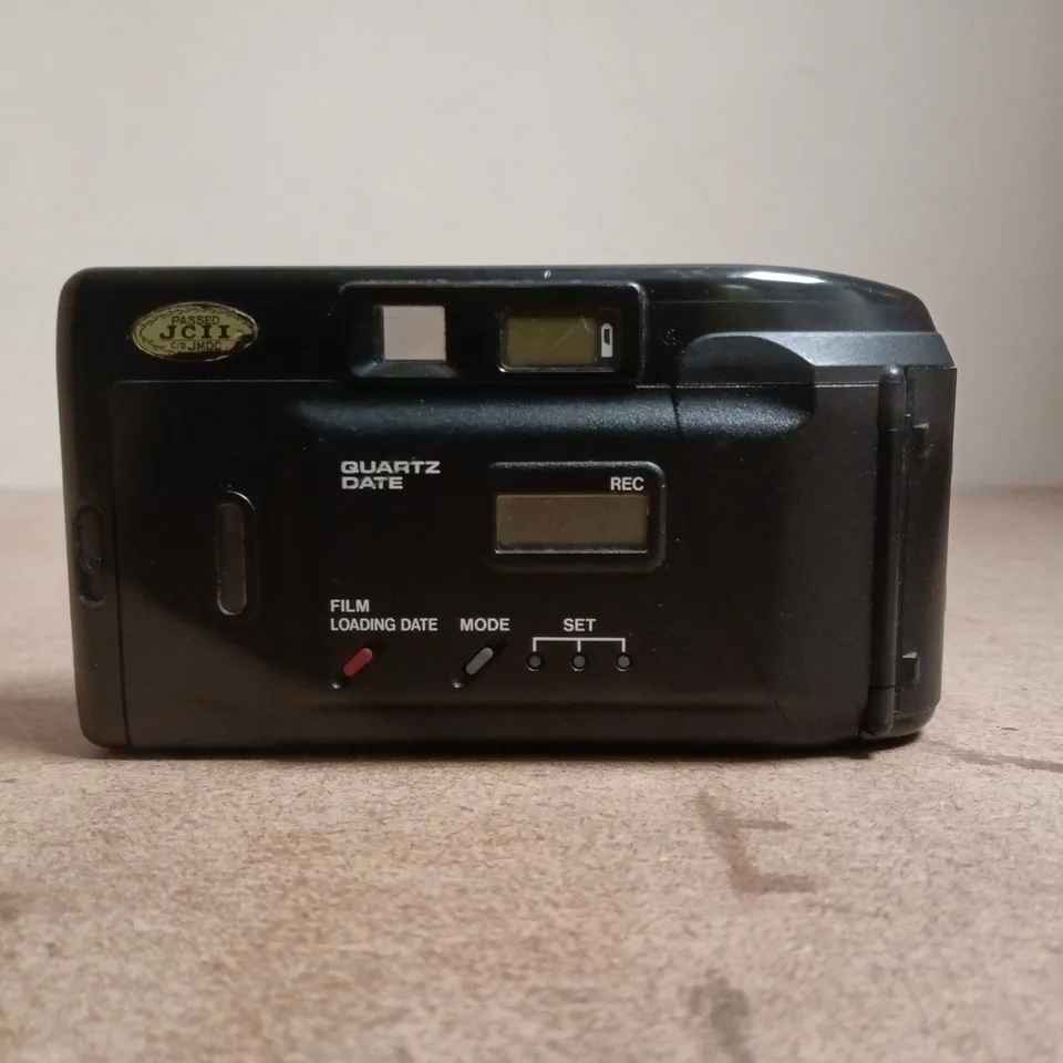 CANON SURE SHOT SUPREME QUARTZ DATE CAMERA