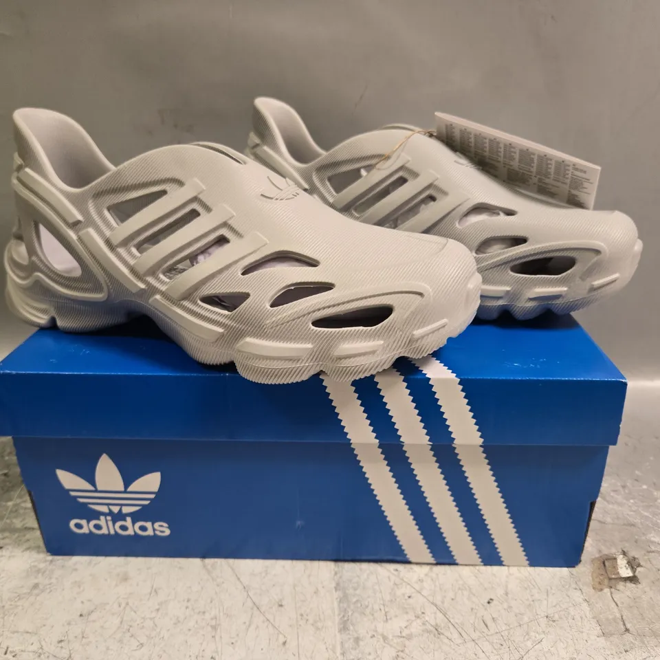 BOXED PAIR OF ADIDAS ADIFOM SUPERNOVA SHOES IN GREY SIZE UK 6
