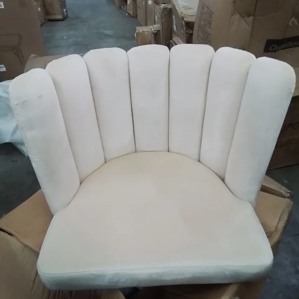 A BOXED CREAM VELVET CURVED BACK CHAIR