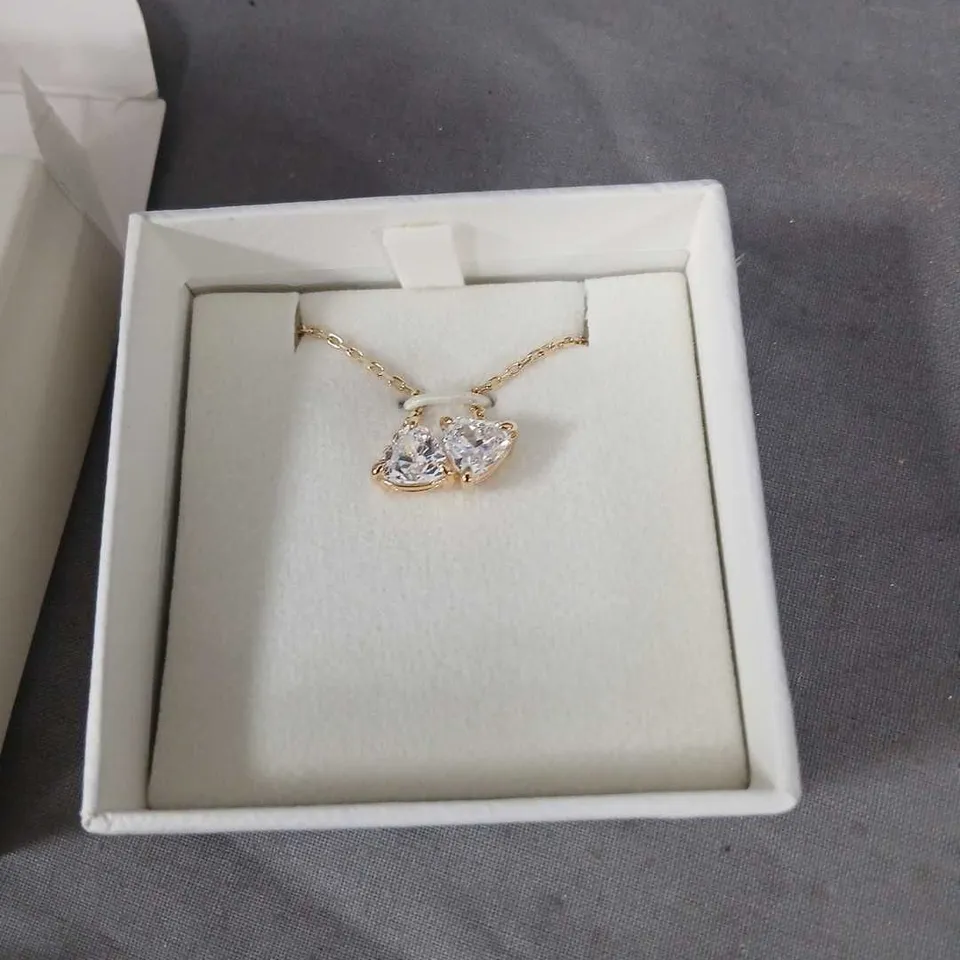SWAROVSKI GOLD-TONE TWIN-HEART PENDANT NECKLACE WITH CLEAR STONES