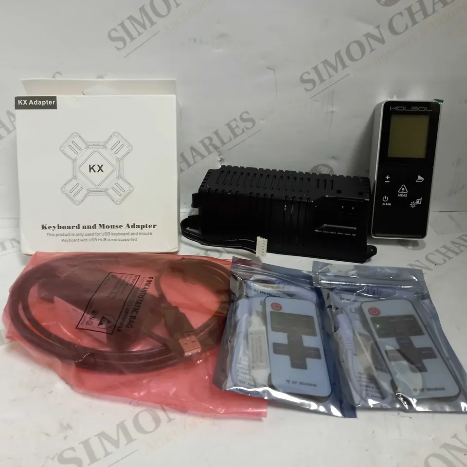 LOT OF APPROXIMATELY 15 ASSORTED ELECTRICAL ITEMS, TO INCLUDE LASER METER, KEYBOARD ADAPTER, ETC