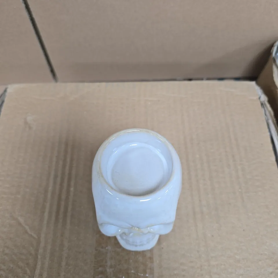 BOX OF 12 GISELA GRAHAM SKULL TEALIGHT HOLDERS