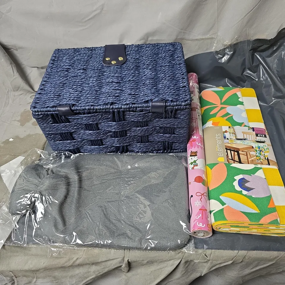 APPROXIMATELY 20 ASSORTED HOUSEHOLD ITEMS TO INCLUDE HAMPER, WRAPPING PAPER, TABLE RUNNER, HOT WATER BOTTLE ETC