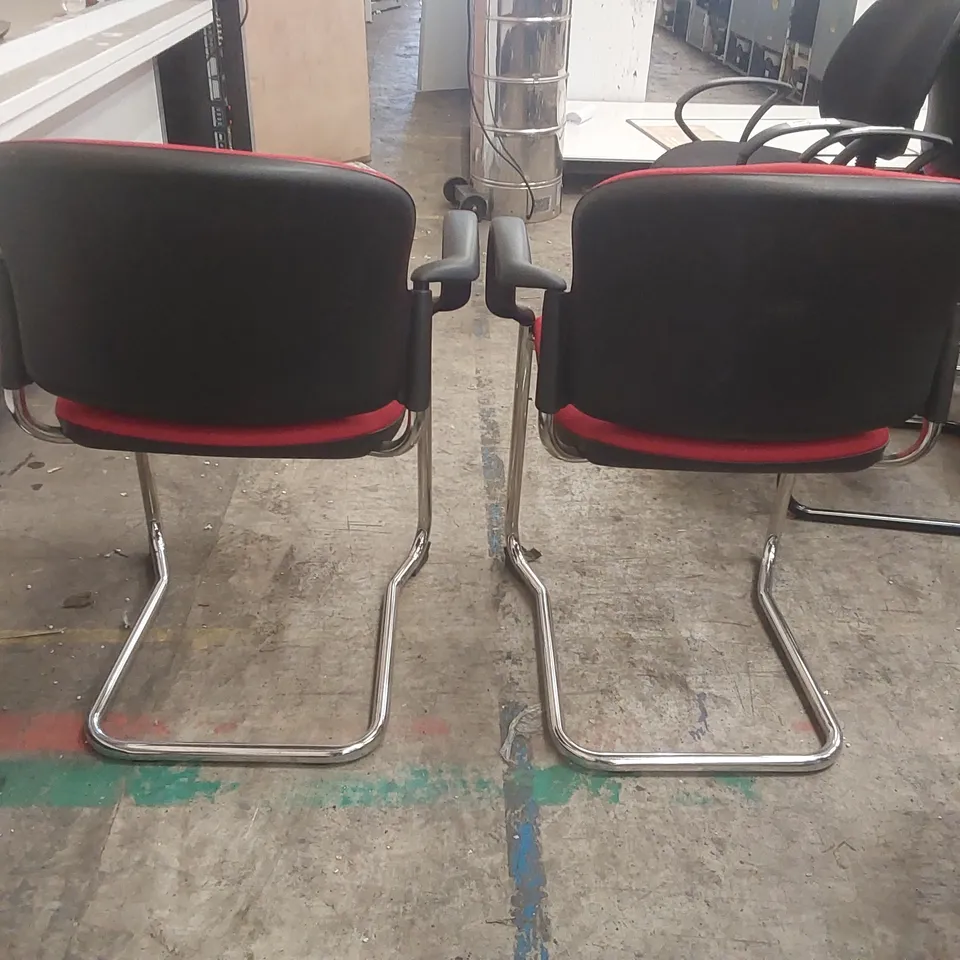 PAIR OF RED UPHOLSTERED OFFICE CHAIRS