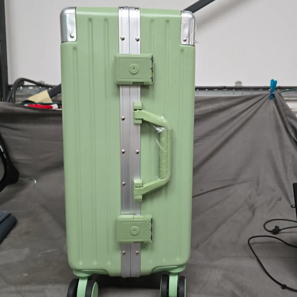 PASTEL GREEN HARD-SHELL CARRY-ON SUITCASE WITH FOUR WHEELS 