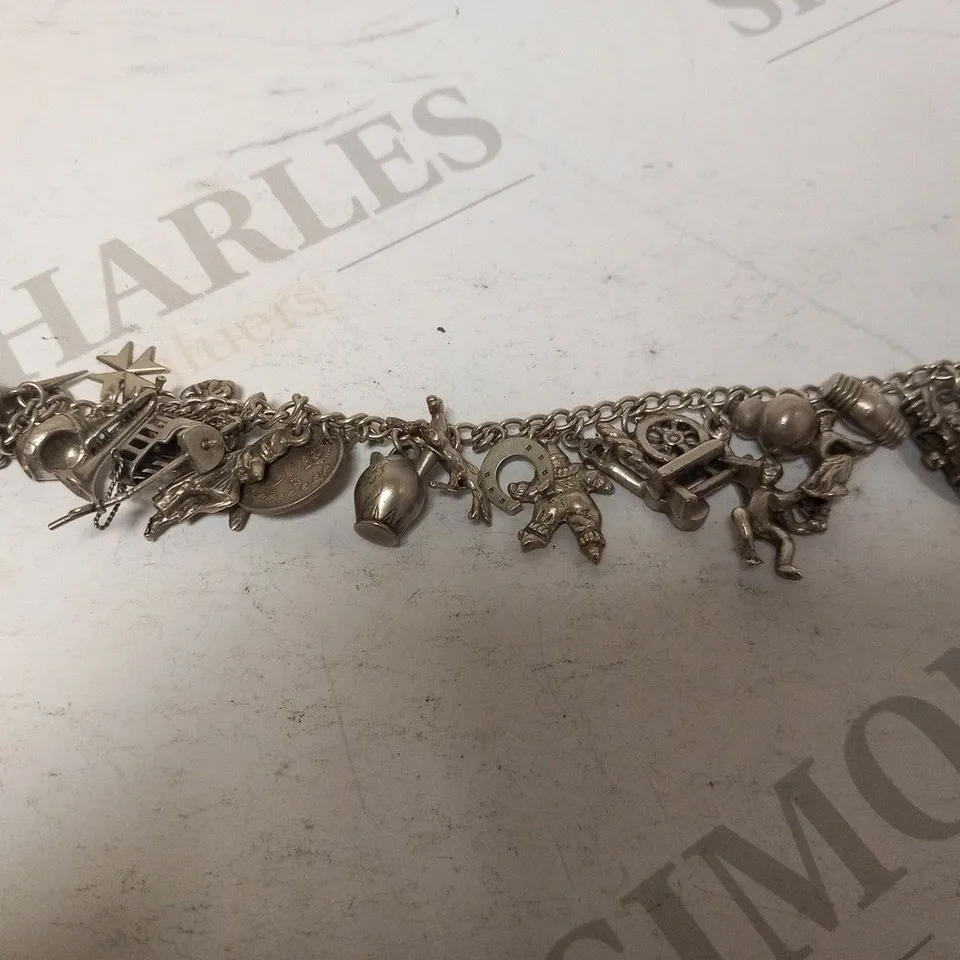 DESIGNER CHARM BRACELET AND ASSORTED CHARMS