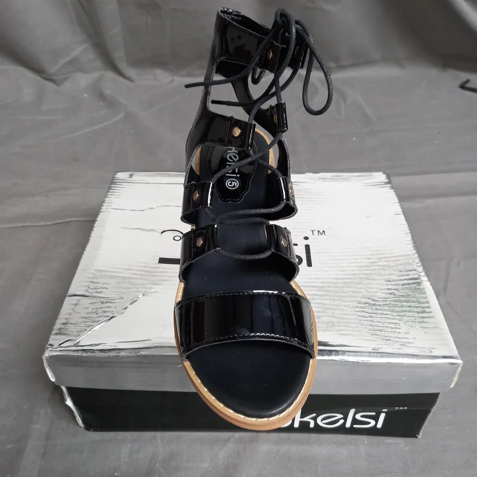 BOX OF APPROXIMATELY 12 PAIRS OF KELSI STRAP HEELED SANDALS IN BLACK  - VARIOUS SIZES