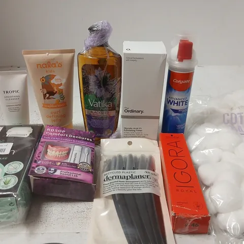APPROX 12 ASSORTED BEAUTY PRODUCTS TO INCLUDE TROPIC CLEANSER, COLGATE TOOTHPASTE, COTTON BALLS, ETC 