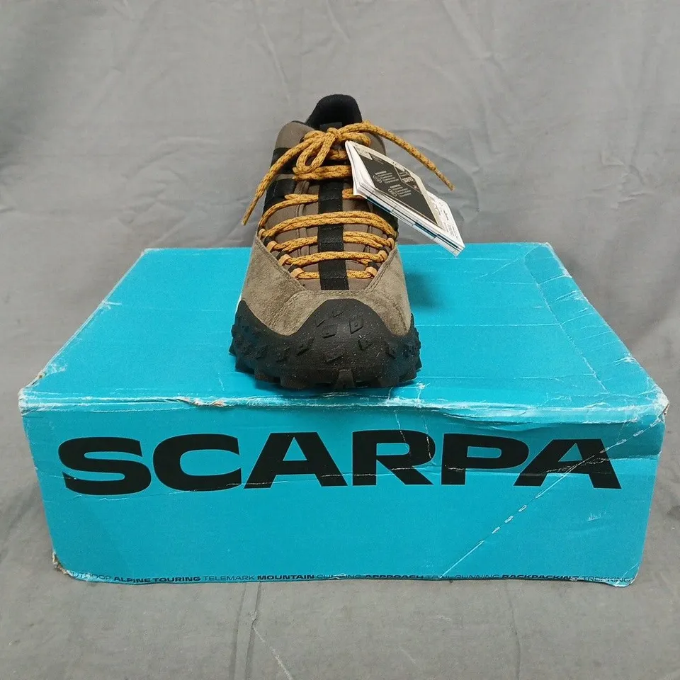 BOXED PAIR OF SCARPA TRAINERS IN MUD/BLACK SIZE UK 7